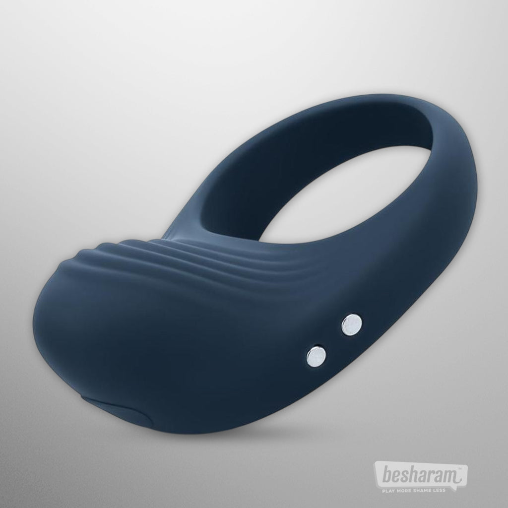 Side view of the Boners Vibrating Cock Ring with charging points visible