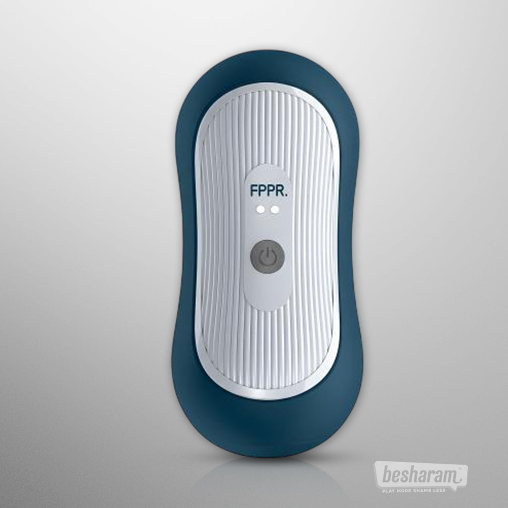 Front view of the FPPR Squeezable Vibrating Masturbator showing control button and textured panel