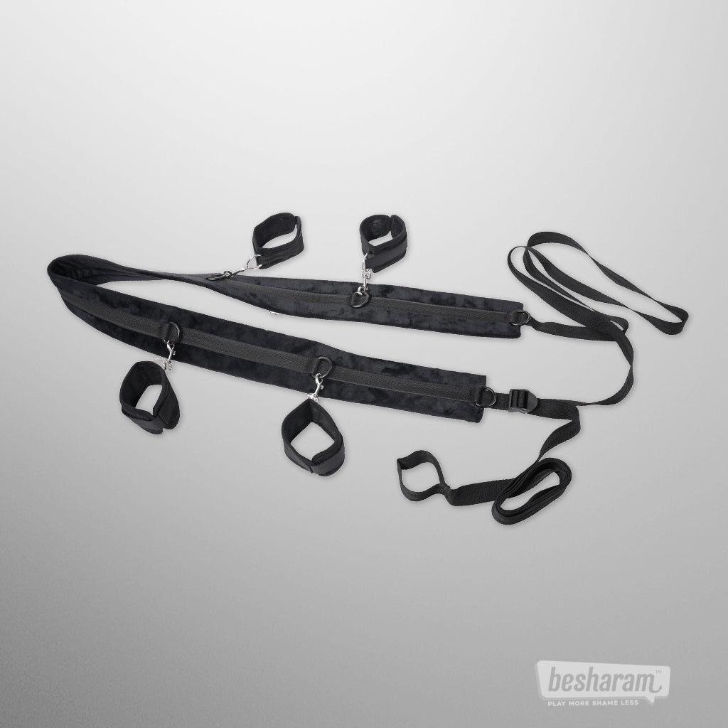 Complete Sportsheets no matter where restraint kit with straps, connectors, and padded cuffs displayed together