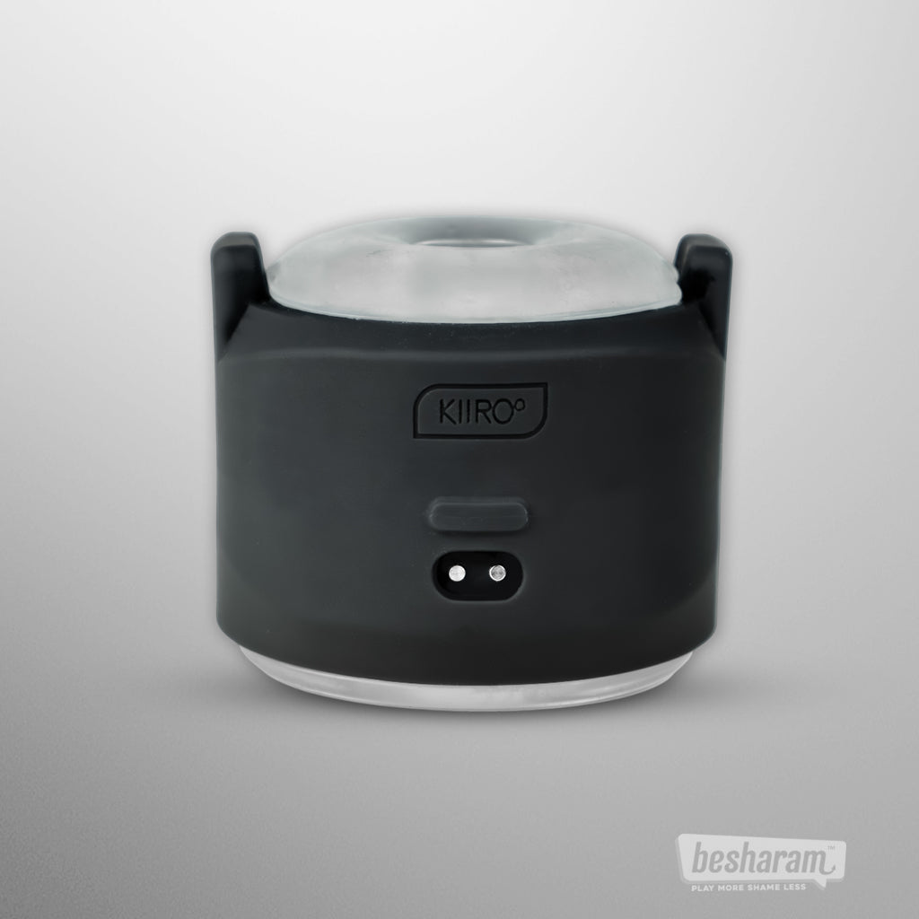 Front view of the Kiiroo PowerShot interactive male stroker with transparent sleeve