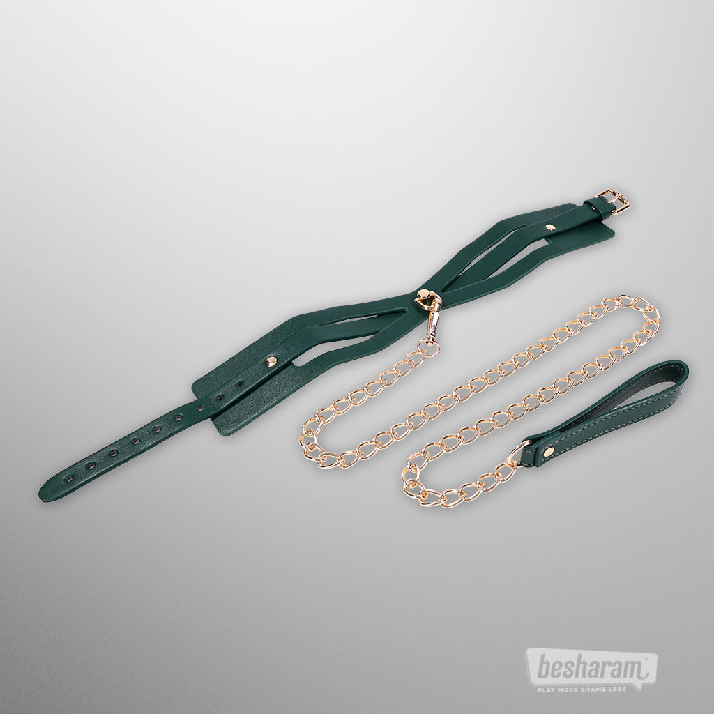 Green Indica cutout collar and gold chain leash set by Sex & Mischief laid flat