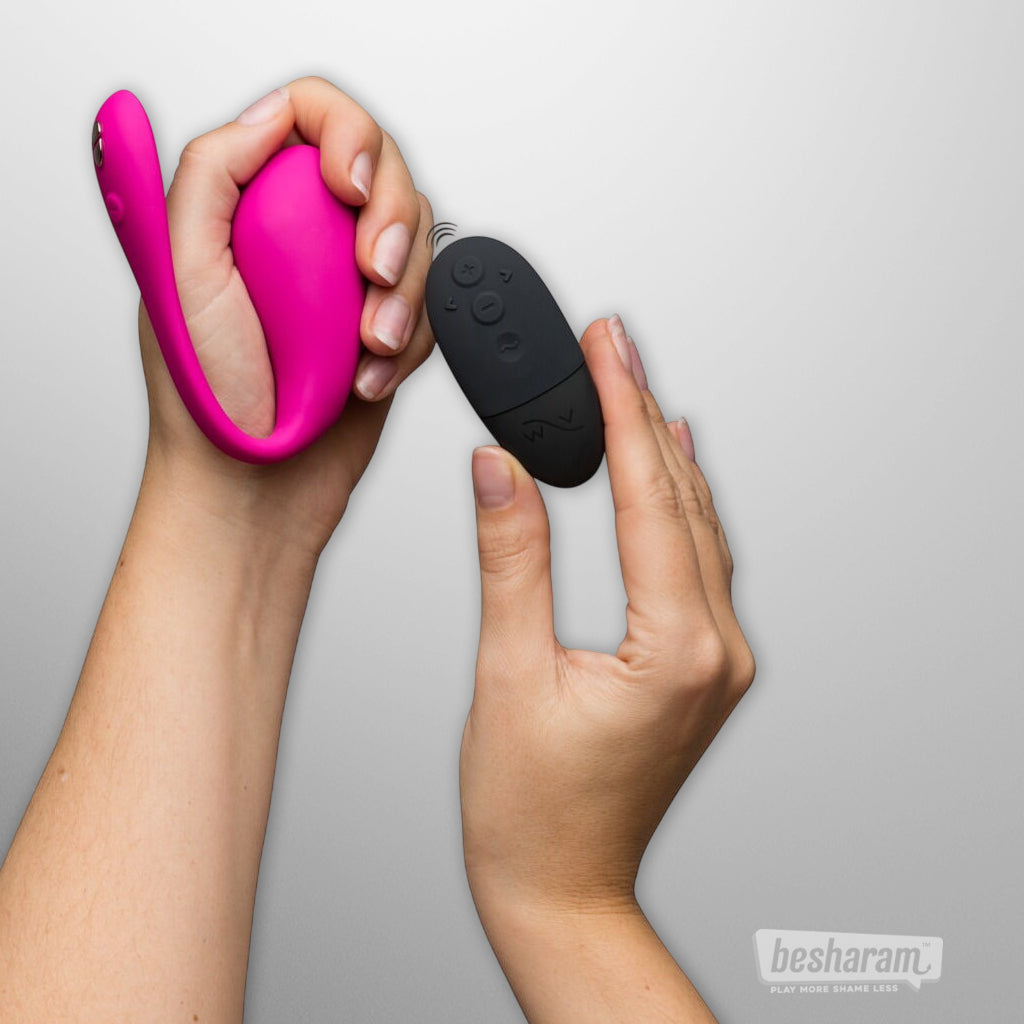 We-Vibe Jive 2 and wireless remote shown held in hands for scale.