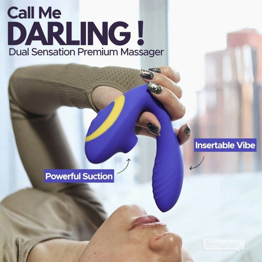 Darling Premium Dual Massager shown in hand highlighting powerful suction and insertable vibe