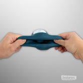 FPPR Squeezable Vibrating Masturbator shown stretched by hand to highlight flexible design