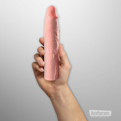3 inch vibrating penis sleeve held in hand showing realistic silicone texture and size