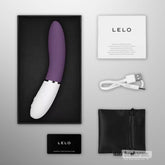 LELO LIV 3 app controlled G spot vibrator unboxed with accessories, purple and white silicone vibrator shown with charger pouch manual and warranty card