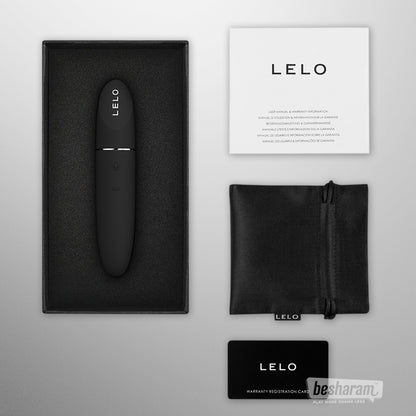 LELO Mia 3 vibrator unboxed with accessories, black silicone personal vibrator shown with pouch charger manual and warranty card