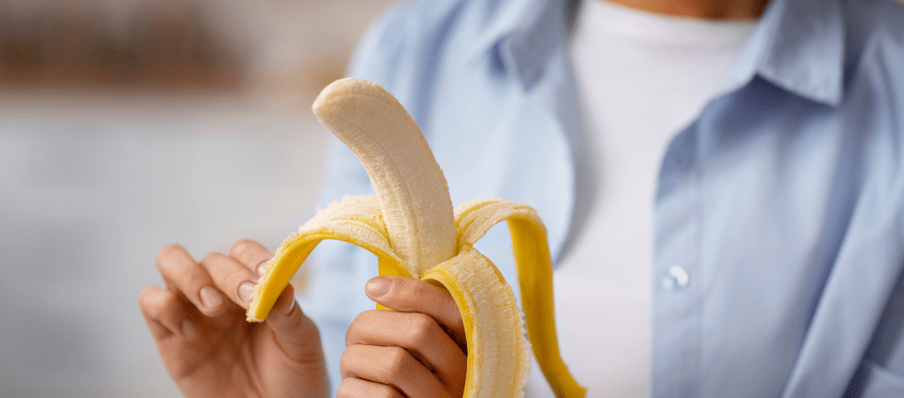 penis owner male opening a banana