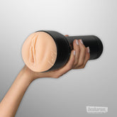 Hand holding Kiiroo Feel Lacy Lennon male masturbator front view
