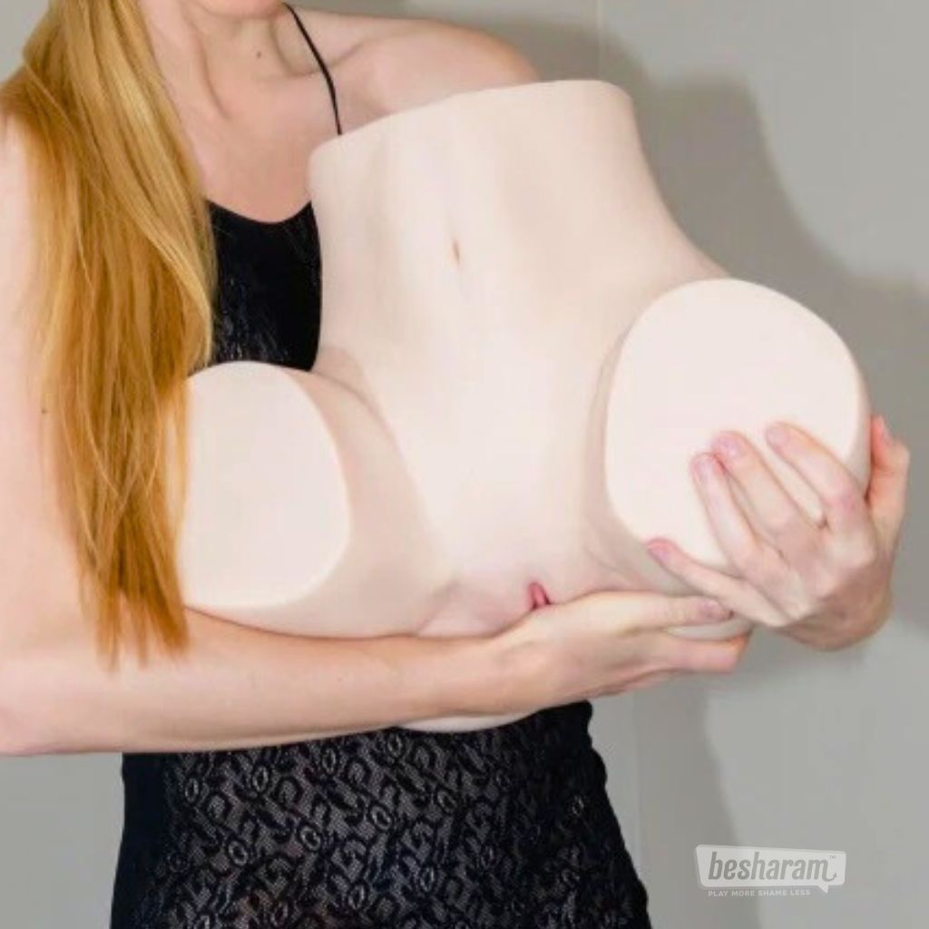 Lightweight torso sex doll shown in hands to highlight manageable size