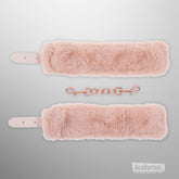 Peaches n Creame faux fur handcuffs in soft blush pink with rose gold chain connector front view