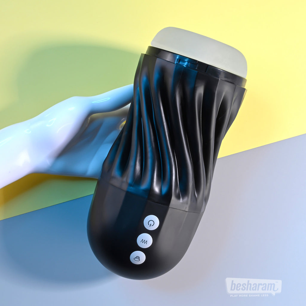 Playboy Solo Vibrating and Sucking Masturbator held in hand to show size and grip