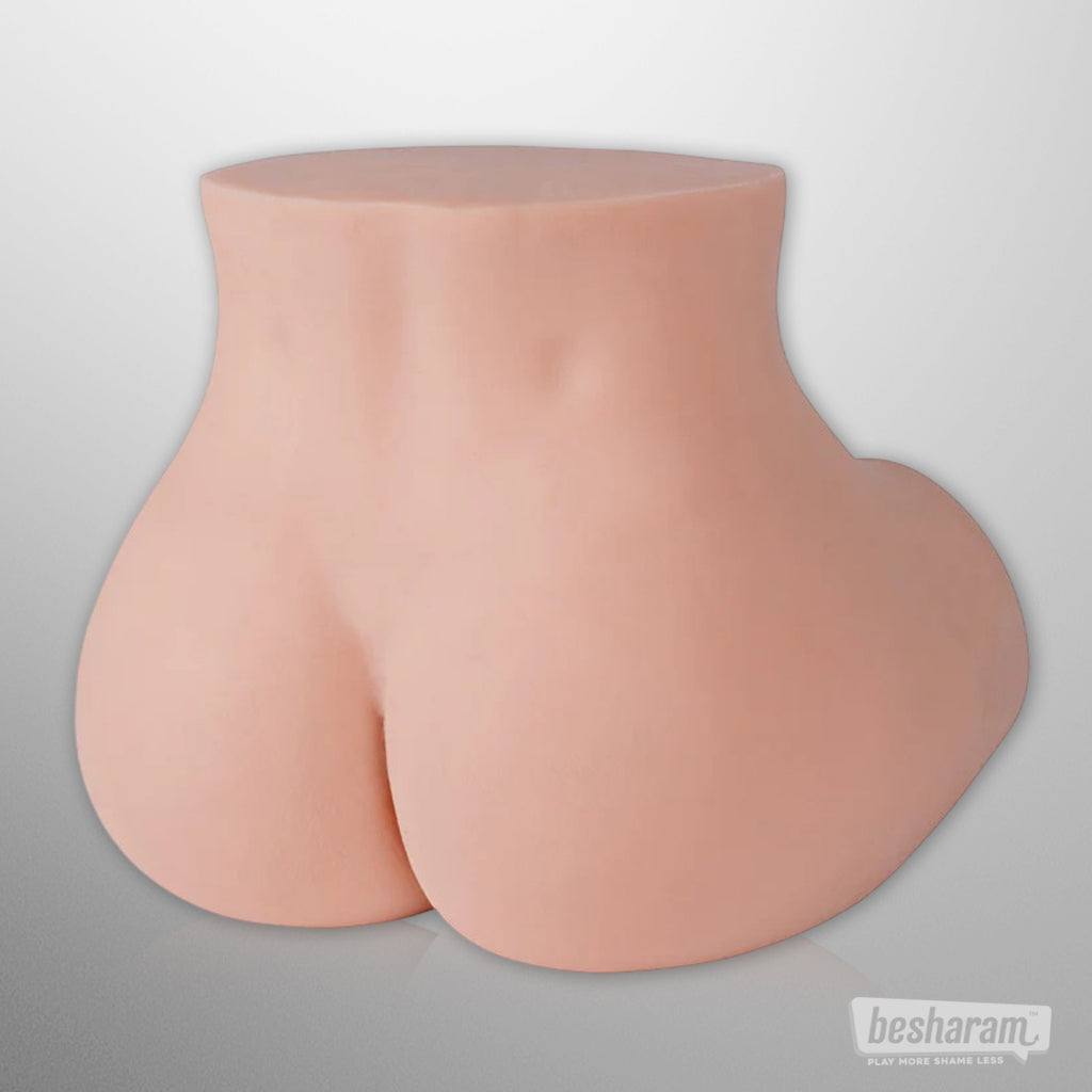 Smooth back view of the realistic butt doll showing hip and lower body shape.