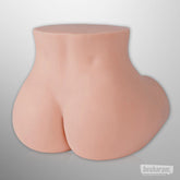 Smooth back view of the realistic butt doll showing hip and lower body shape.