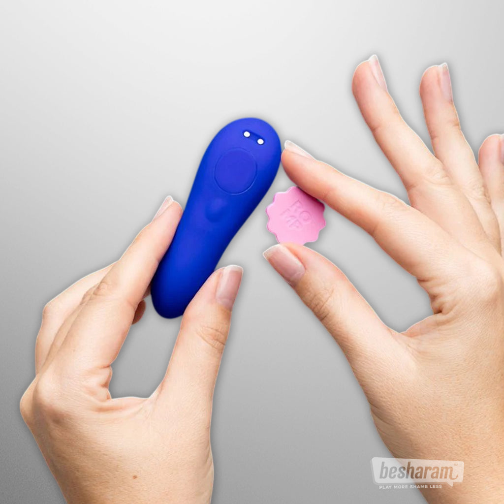 Close up of ROMP Party panty vibrator with removable magnetic clip accessory