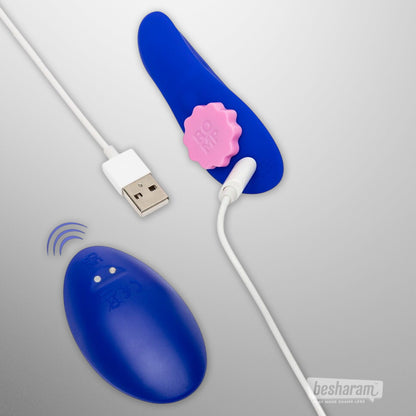 ROMP Party panty vibrator connected to USB charging cable with remote nearby