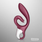Side view of Satisfyer Love Me rabbit vibrator in red silicone
