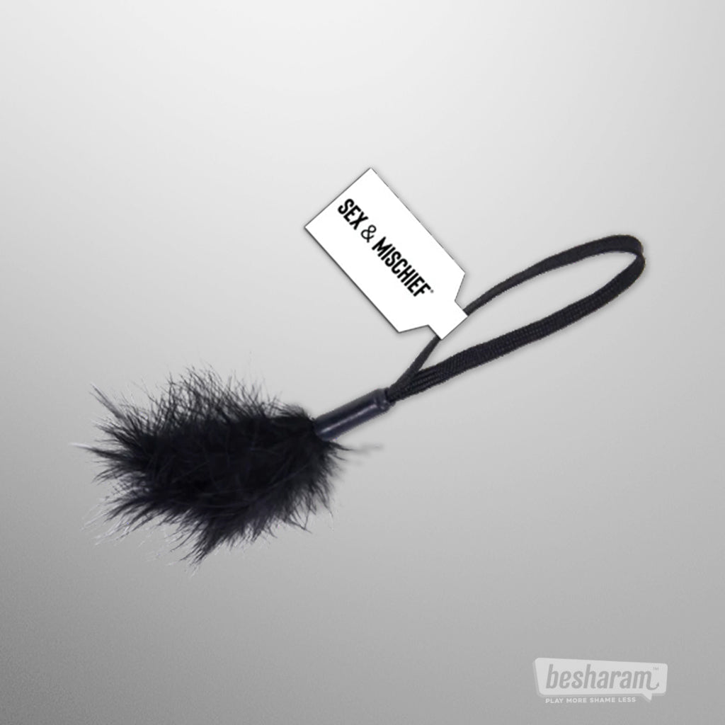 Soft black feather tickler wrist teaser designed for foreplay and touch play
