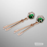 Gold tone nipple clips with green crystal charms by Sex & Mischief