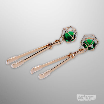 Gold tone nipple clips with green crystal charms by Sex &amp; Mischief