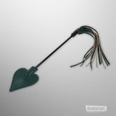 Green Indica dual impact crop with leather tip and tassel handle by Sex & Mischief