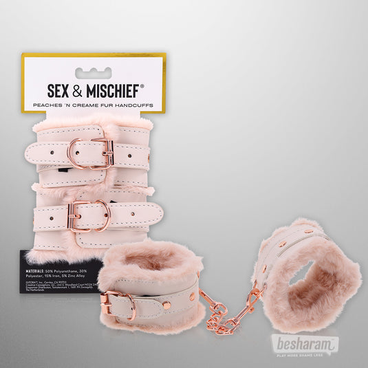 Sex and Mischief Peaches n Creame fur handcuffs with retail packaging and rose gold chain detail