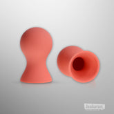 Sex & Mischief Peaches n Creame silicone nipple suckers in peach color shown from front and side view