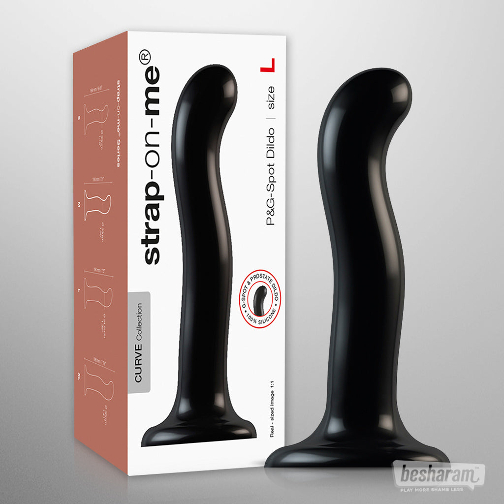 Strap-on-me Curve P and G spot dildo size L in black shown next to its packaging.