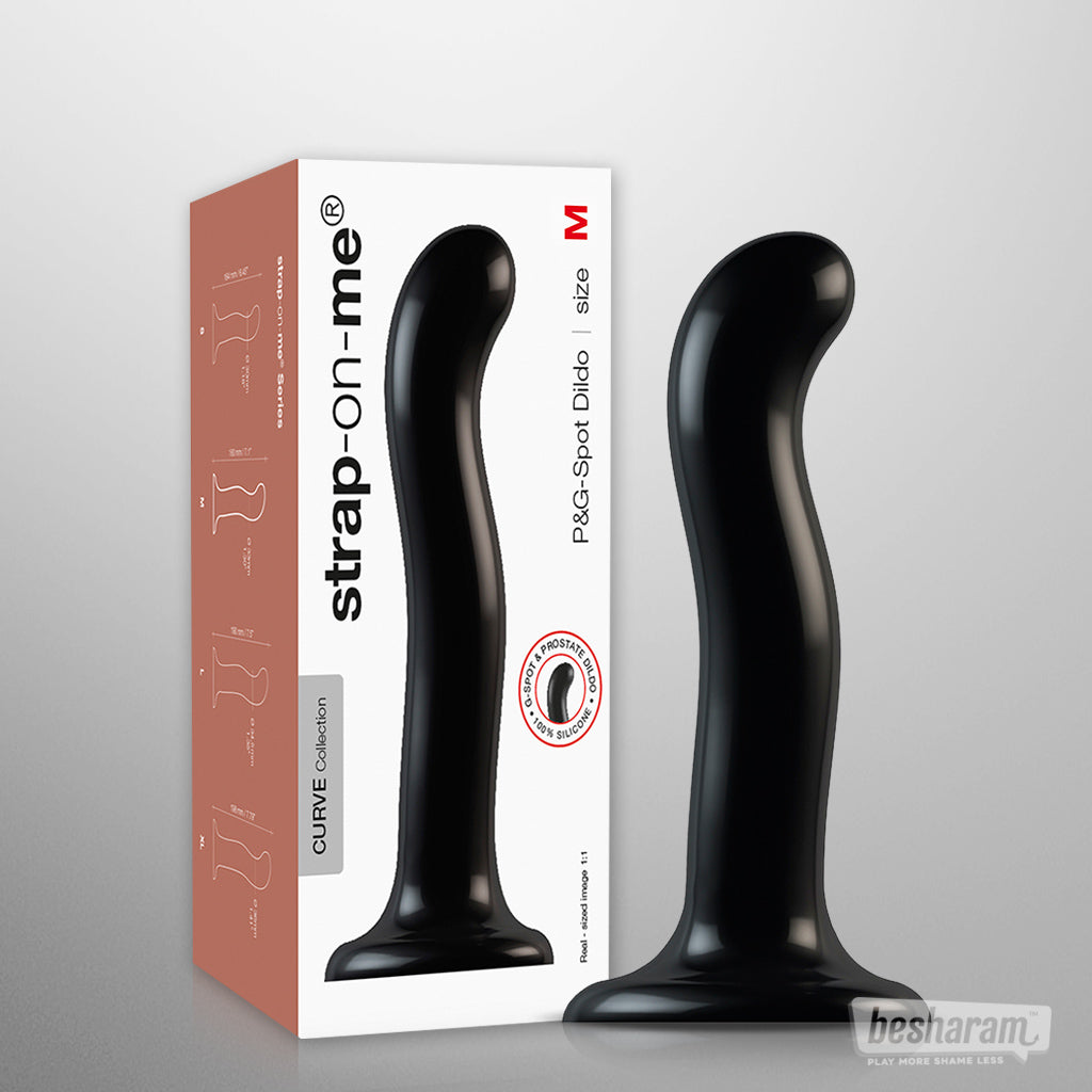 Strap-on-me Curve P and G spot dildo size M in black displayed with product box.