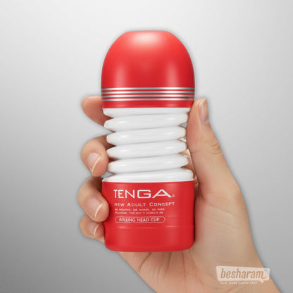 Tenga Rolling Head Cup masturbator held in hand showing compact ribbed design
