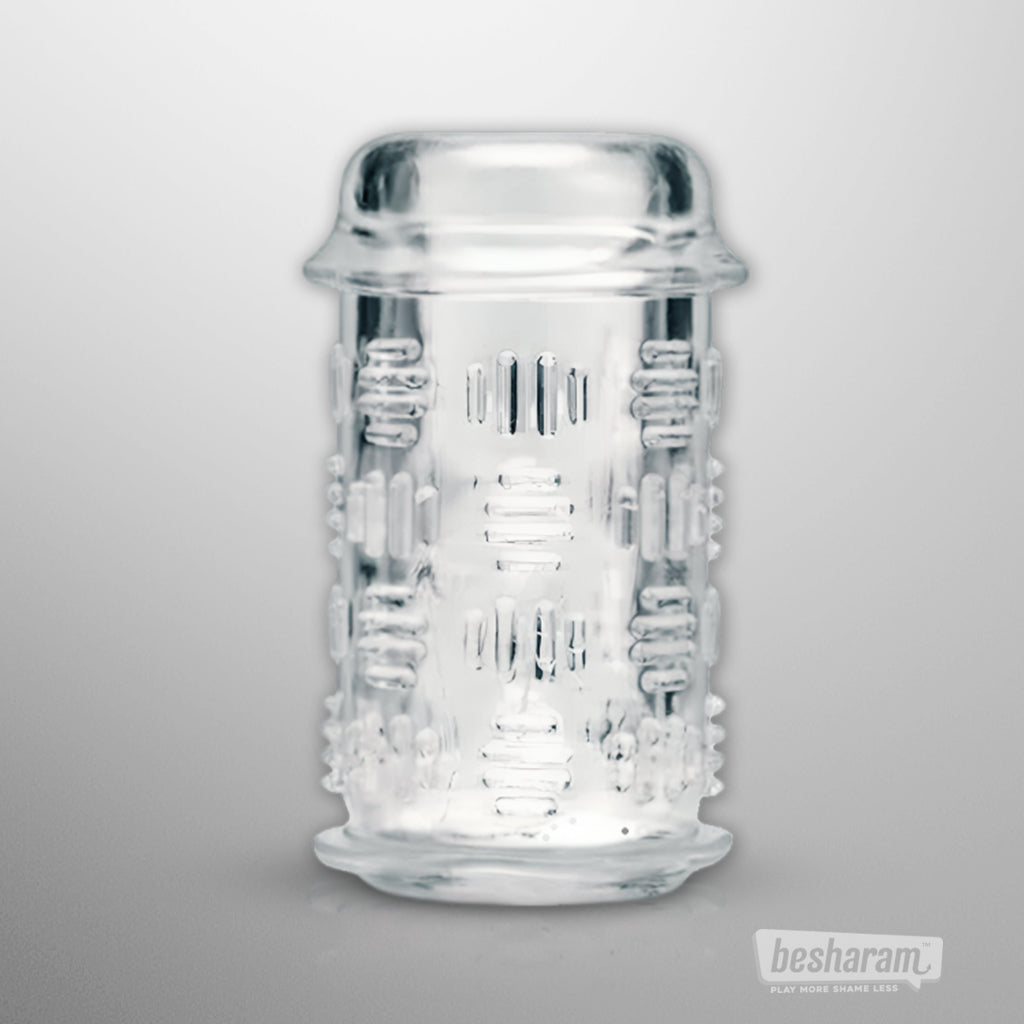 Clear textured masturbator sleeve with raised grip details and ribbed inner texture